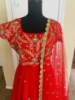Picture of Red anarkali dress with heavy Maggam work