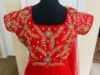 Picture of Red anarkali dress with heavy Maggam work