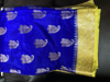 Picture of brand new royal blue  pattu saree with silver butties
