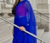 Picture of Blue Plain saree with Pink Blouse and Embroidered Blouse