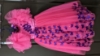 Picture of Hot pink gown with ruffle sleeves and butterfly headband