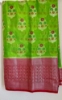 Picture of parrot green soft banaras saree