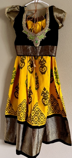 Picture of Brand new Bright mango yellow and black Ikkat pure pattu lehenga