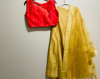 Picture of Tomato RED and gold colorcrop top paried with gold duppata