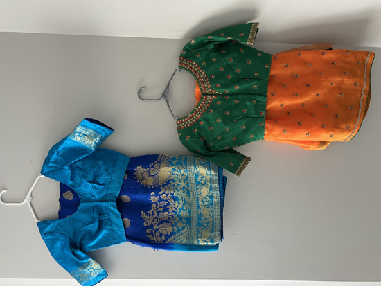 Picture of 2 sarees with blouses