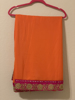 Picture of Orange and pink fancy saree