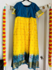 Picture of Green and yello long frock half sleeves and pattu border(XL)