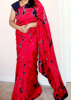 Picture of Red Shibori saree with mirror work blouse