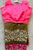 Picture of pink and lentil green color saree with pink border thread work on it