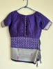 Picture of Purple saree with silver border