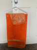 Picture of Bright Orange saree with matching mirror blouse