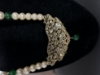 Picture of Pearl mala with green beads