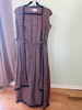 Picture of Rust color long dress with belted cape and short palazzo pant