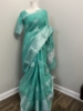 Picture of New silver weaving c green shade soft Kota saree