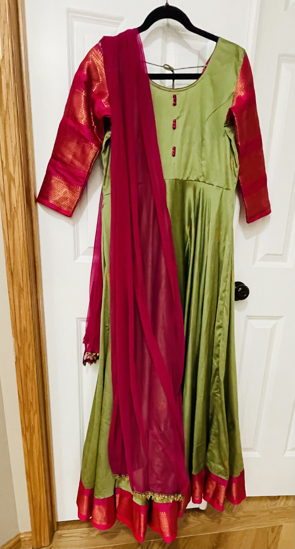 Picture of Light green and pink fancy silk pattu long dress