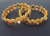 Picture of guthapusulu necklace with temple antique navaratan bangles