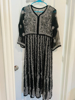 Picture of New Black chikankari kurti with allover jal work and colour full summer pop up dress