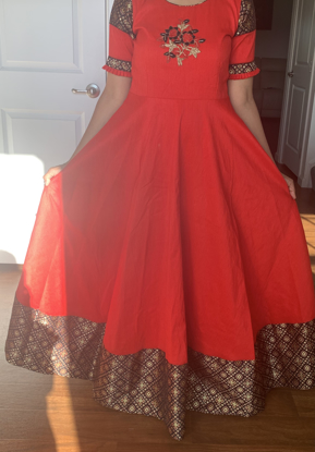 Picture of Red long frock with benarsi border