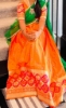 Picture of Orange and green half saree