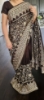 Picture of Brown georgette saree with rich pallu