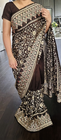 Picture of Brown georgette saree with rich pallu