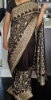 Picture of Brown georgette saree with rich pallu