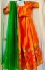 Picture of Orange and green half saree