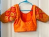 Picture of Orange and green half saree