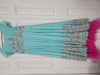 Picture of Blue sequin dress with pink frills