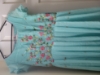 Picture of Blue sequin dress with pink frills