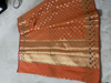 Picture of Orange banarasi saree