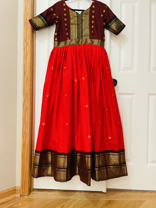 Picture of Tomato red   and brown pattu  silk Long  dress with double  border and body yoke
