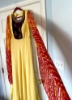 Picture of Yellow bandhani cape sleeves long dress