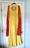 Picture of Yellow bandhani cape sleeves long dress