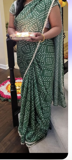 Picture of bandhini saree with maggam work blouse