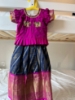 Picture of pink and navy blue pattu langa 1y