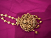 Picture of Pearl chain with lakshmi pendant and earrings