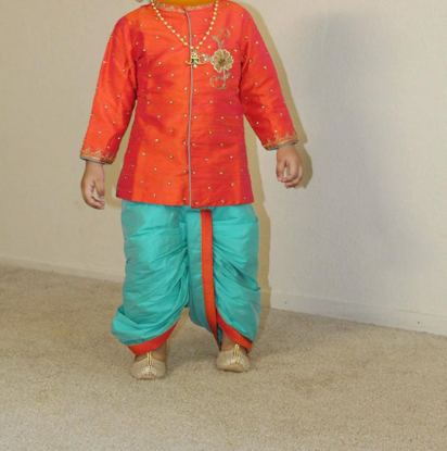 Picture of orange and sky blue kurtha 1y