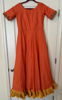 Picture of Orange Silk dress with maggam work