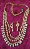 Picture of CZ earrings along with kundan set