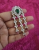 Picture of CZ earrings along with kundan set