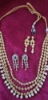 Picture of CZ earrings along with kundan set