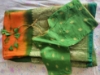Picture of New green and orange shibori saree