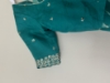 Picture of light green leheriya saree