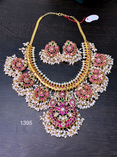 Picture of Gorgeous Brand new Necklace set :Brass metal with gold plating with real kundans & rice pearls