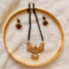 Picture of 4 lines black beads with matching earrings along with hip belt.