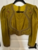 Picture of Golden yellow lehenga croptop