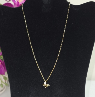 Picture of NEW 92.5 silver black beads chain with butterfly pendant.