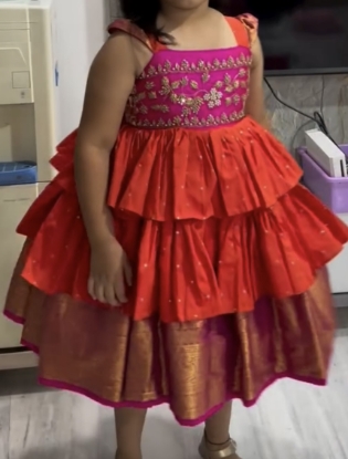 Picture of Orange and pink pattu frock 4y