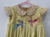 Picture of lemon yellow pearl frock 2-3y